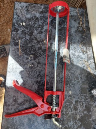 Pistola de silicona roja