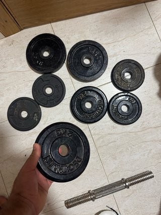 Mancuernas y discos de hierro