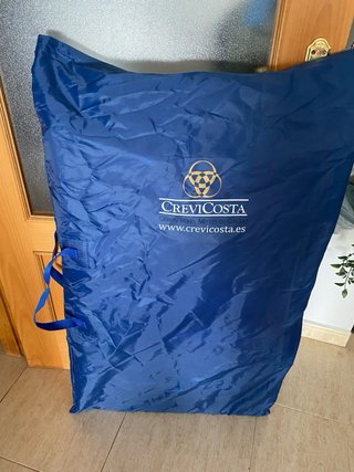 Silla de playa reclinable azul y blanca
