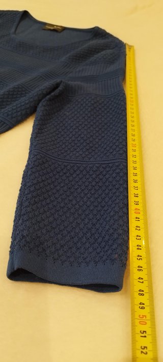 Vestido midi de punto de la marca Roberto Verino.