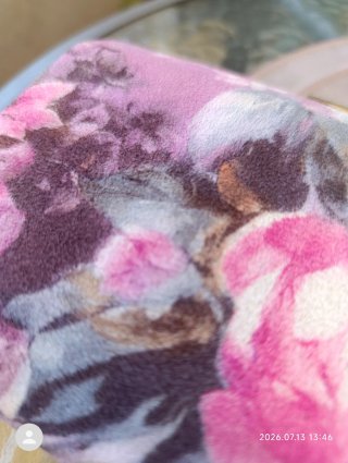 Bolso de mano con cadena floral