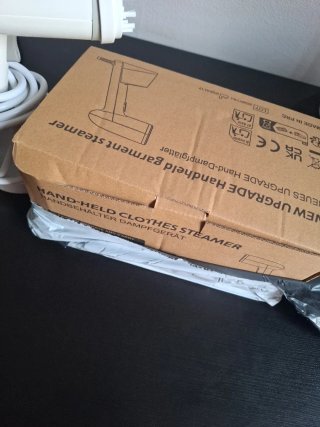 Plancha de vapor vertical para ropa nueva en caja