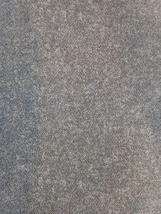 Butaca grande tapizada gris