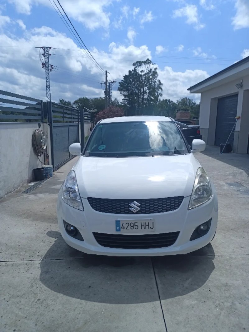 Suzuki Swift 2011 - foto 1