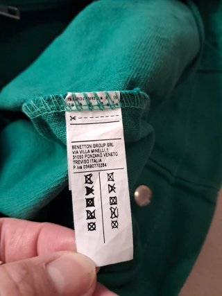 Bolso Benetton verde con estampado de ovejas