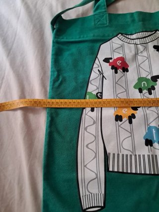 Bolso Benetton verde con estampado de ovejas