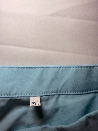 Blusa azul celeste con lazo y volantes - Talla 2XL