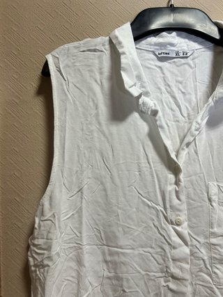 Camisa sin mangas blanca