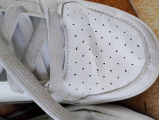 Scarpe Puma bianche e blu