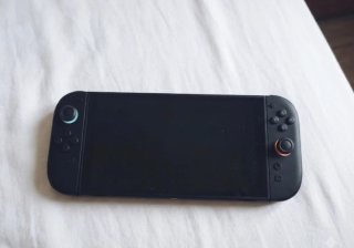 Nintendo Switch + Super Mario Odyssey