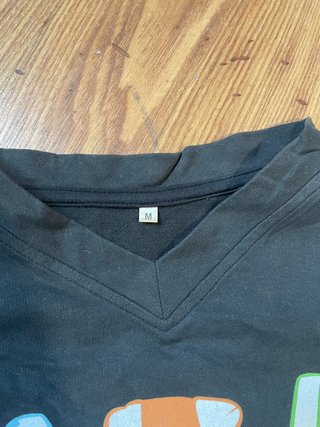 Camiseta Adidas manga larga con zapatillas