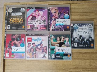 Consola PS3 Negra + 2 Mandos + Juegos +Micrófonos