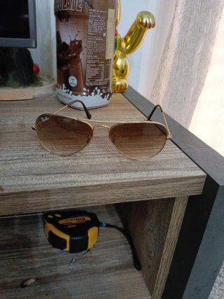Occhiali da sole Ray-Ban marroni poco usati da donna