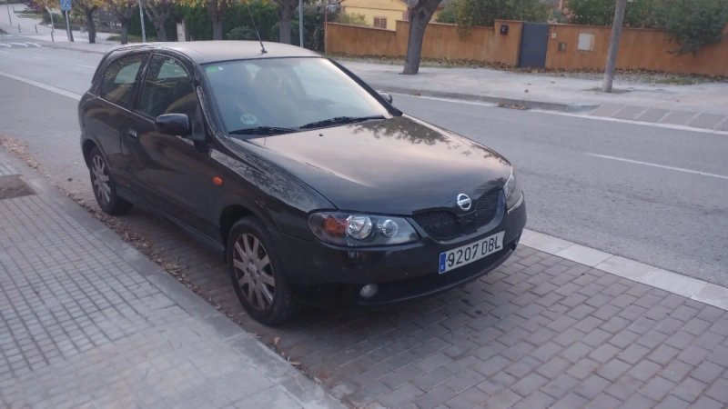 Nissan Almera 2004 - foto 1