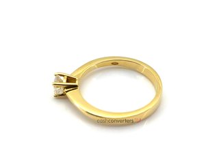 anillo oro 18k con piedra con diamante