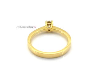 anillo oro 18k con piedra con diamante