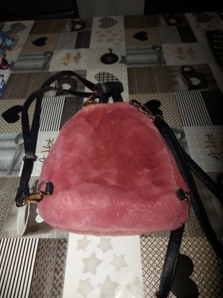 Mochila pequeña pelo rosa