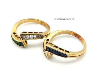 anillo oro 18k con piedra con aguamarina,circonita,esmeralda