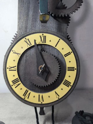 Reloj de pared antiguo volatín