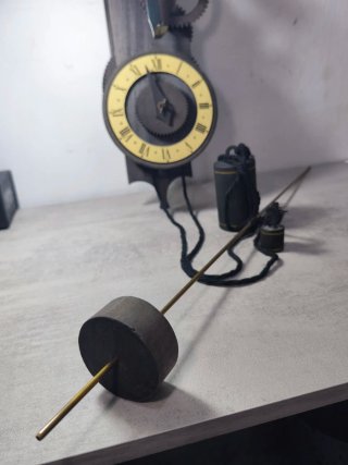 Reloj de pared antiguo volatín