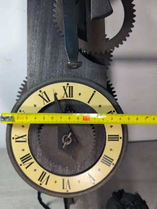 Reloj de pared antiguo volatín