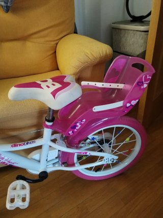 Bicicleta infantil rosa y blanca