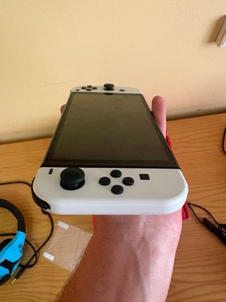 Nintendo Switch OLED Bianca + Accessori + Giochi