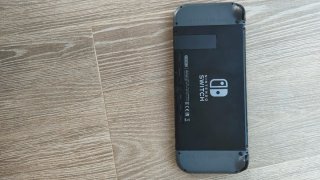 Nintendo Switch Negra Gris con 5 juegos
