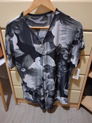 Jersey floral con cremallera