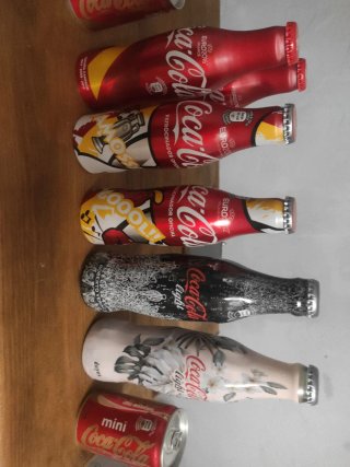 Collezione Coca-Cola: Bottiglie e Lata