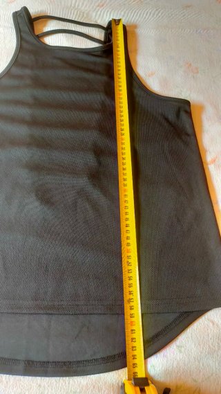 Camiseta negra tirantes cruzados Talla L. 2 €