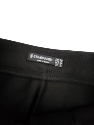 Pantalones negros de campana