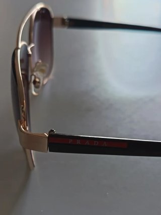 Gafas de sol aviador doradas y marrones