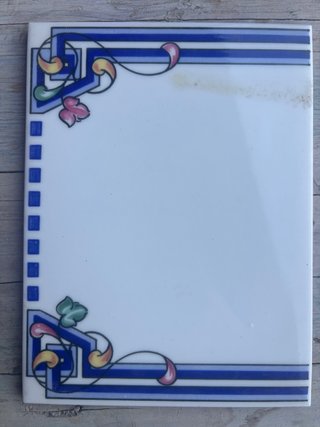 Azulejo decorativo azul y blanco