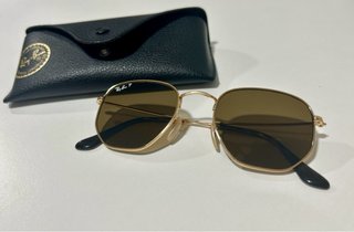 Gafas de sol Ray-Ban doradas y marrones
