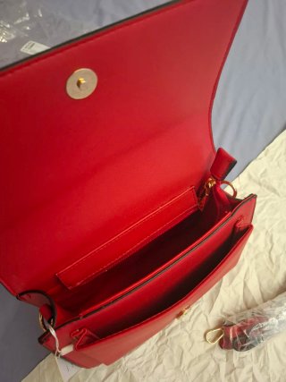 Borsa rossa con tracolla