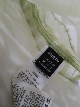 Top verde con tirantes y lazada