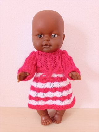 Muñeca Bebé Africana + Orinal Musical Rosa
