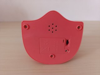 Muñeca Bebé Africana + Orinal Musical Rosa