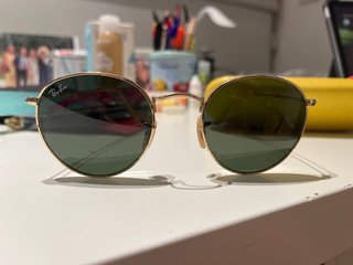 Gafas de sol Ray-Ban redondas doradas