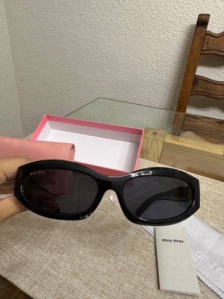 Occhiali da sole Miu Miu neri da donna