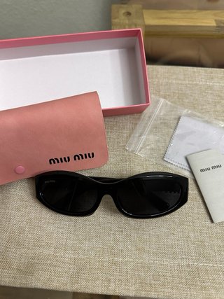 Occhiali da sole Miu Miu neri da donna
