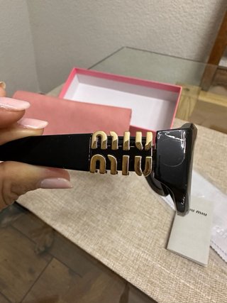 Occhiali da sole Miu Miu neri da donna