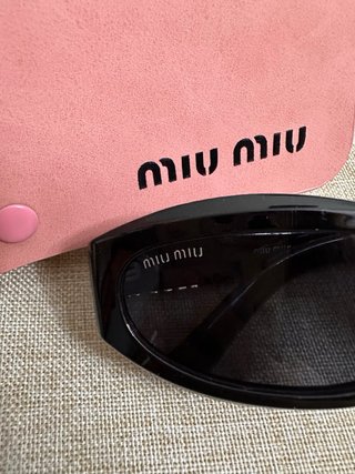 Occhiali da sole Miu Miu neri da donna