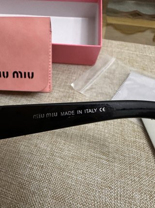 Occhiali da sole Miu Miu neri da donna