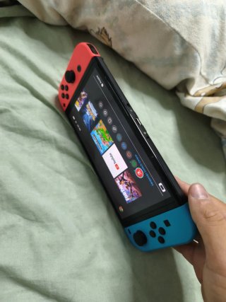 Nintendo Switch OLED Blu/Rosso Completa