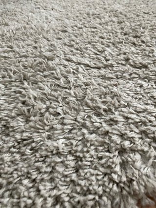 Alfombra beige de poliéster