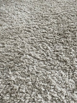 Alfombra beige de poliéster