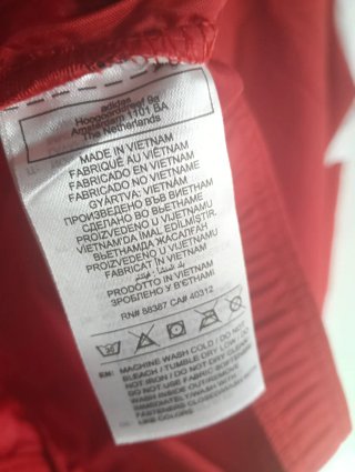 Chaqueta deportiva Adidas roja y blanca larga