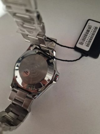 Reloj Orient Naranja y Plateado